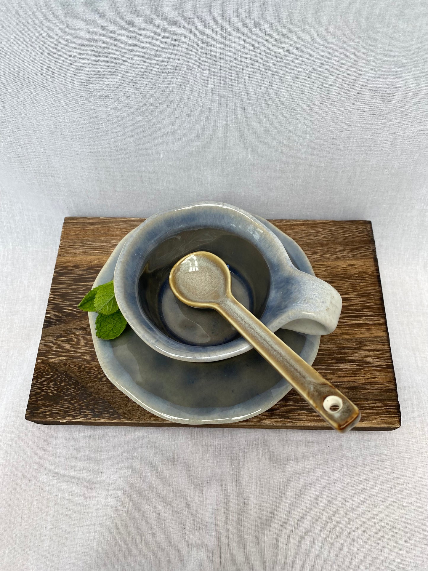 Glazed Cup and Saucer